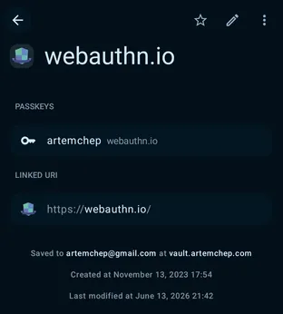 A passkey item stored in the vault next to other login entries